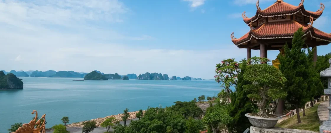 Cai Bau Pagoda exterior nestled in the mountainside, overlooking the coast in Quang Ninh, Vietnam.